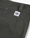 View of model wearing Chimera Eighty-Six Alpha Chino Pants, Loose Fit.