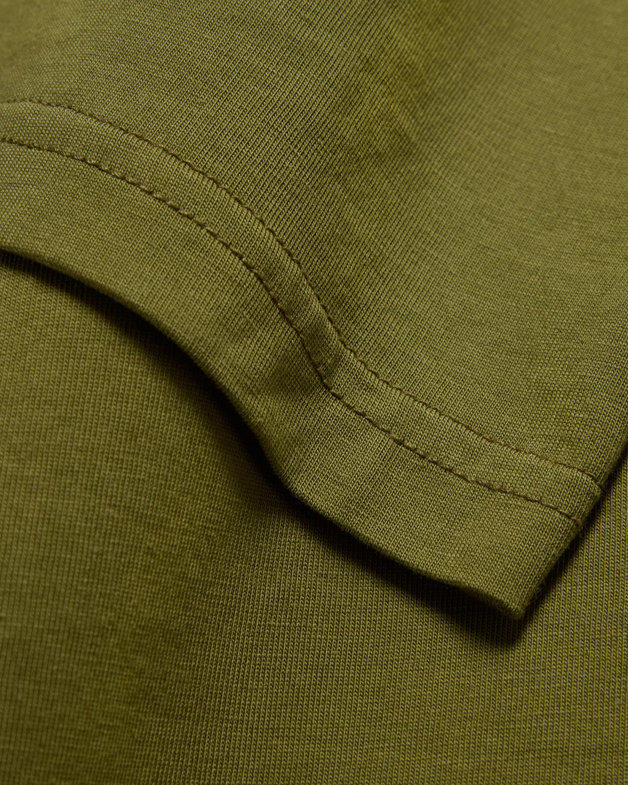 View of model wearing Avocado Crewneck Tee, Slim Fit.