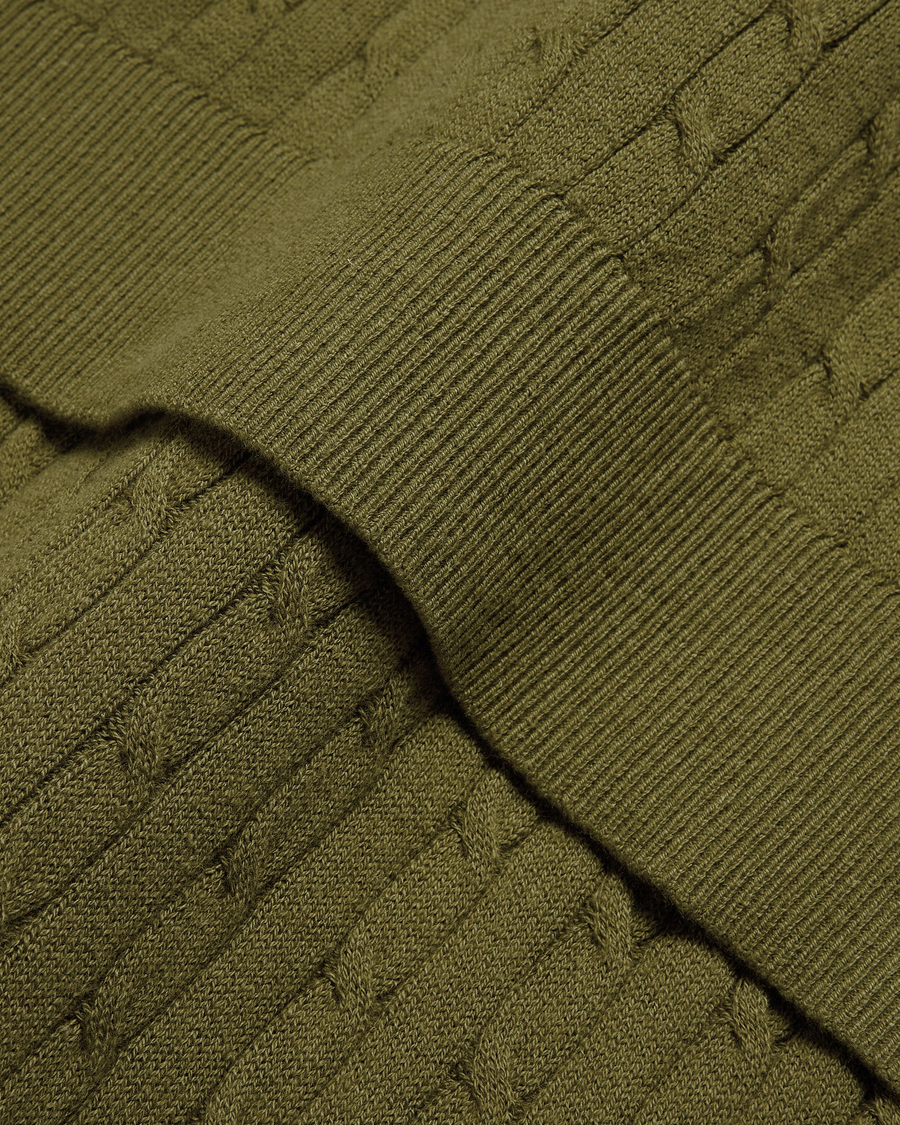 View of model wearing Avocado Sweater Polo, Regular Fit.