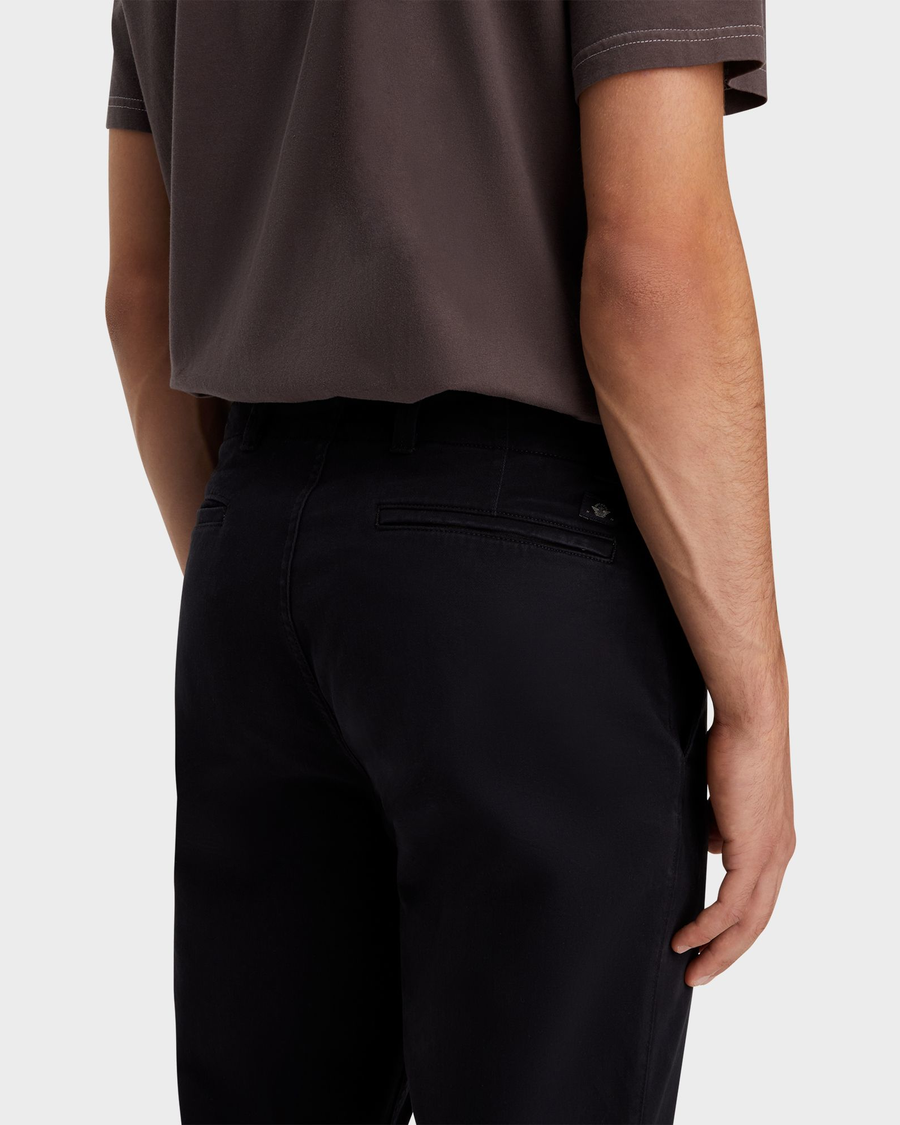 View of model wearing Beautiful Black Alpha Chino Pants, Straight Fit.