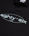 View of model wearing Beautiful Black Eighty-Six Collared Sweatshirt, Relaxed Fit.