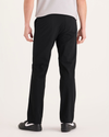 Back view of model wearing Beautiful Black Go Airweave Chino, Straight Fit.