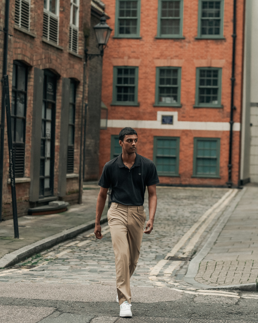 View of model wearing Beautiful Black Men's Slim Fit Signature Go Khaki Pants.