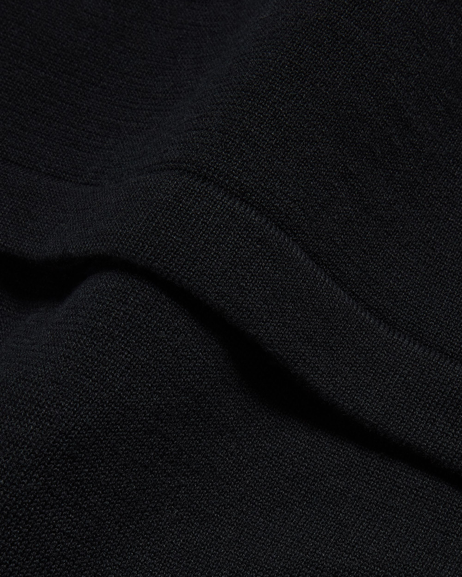 View of model wearing Beautiful Black Sweater Polo, Relaxed Fit.