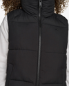 View of model wearing Beautiful Black Women's Puffer Vest Jacket.