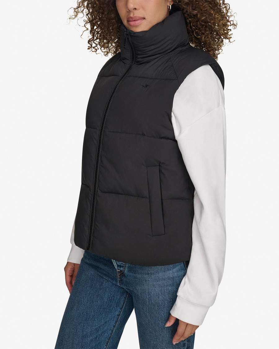 View of model wearing Beautiful Black Women's Puffer Vest Jacket.