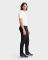 Side view of model wearing Black Crafted Khaki Pants, Slim Fit.