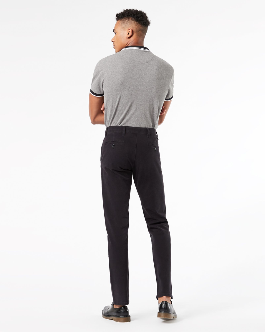 Back view of model wearing Black Men's Slim Fit Smart 360 Flex Ultimate Chino Pants.