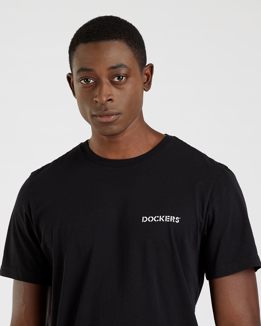 View of model wearing Black Stencil Graphic Tee, Slim Fit.