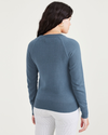 Back view of model wearing Blue Fusion Women's Classic Fit Crewneck Sweater.