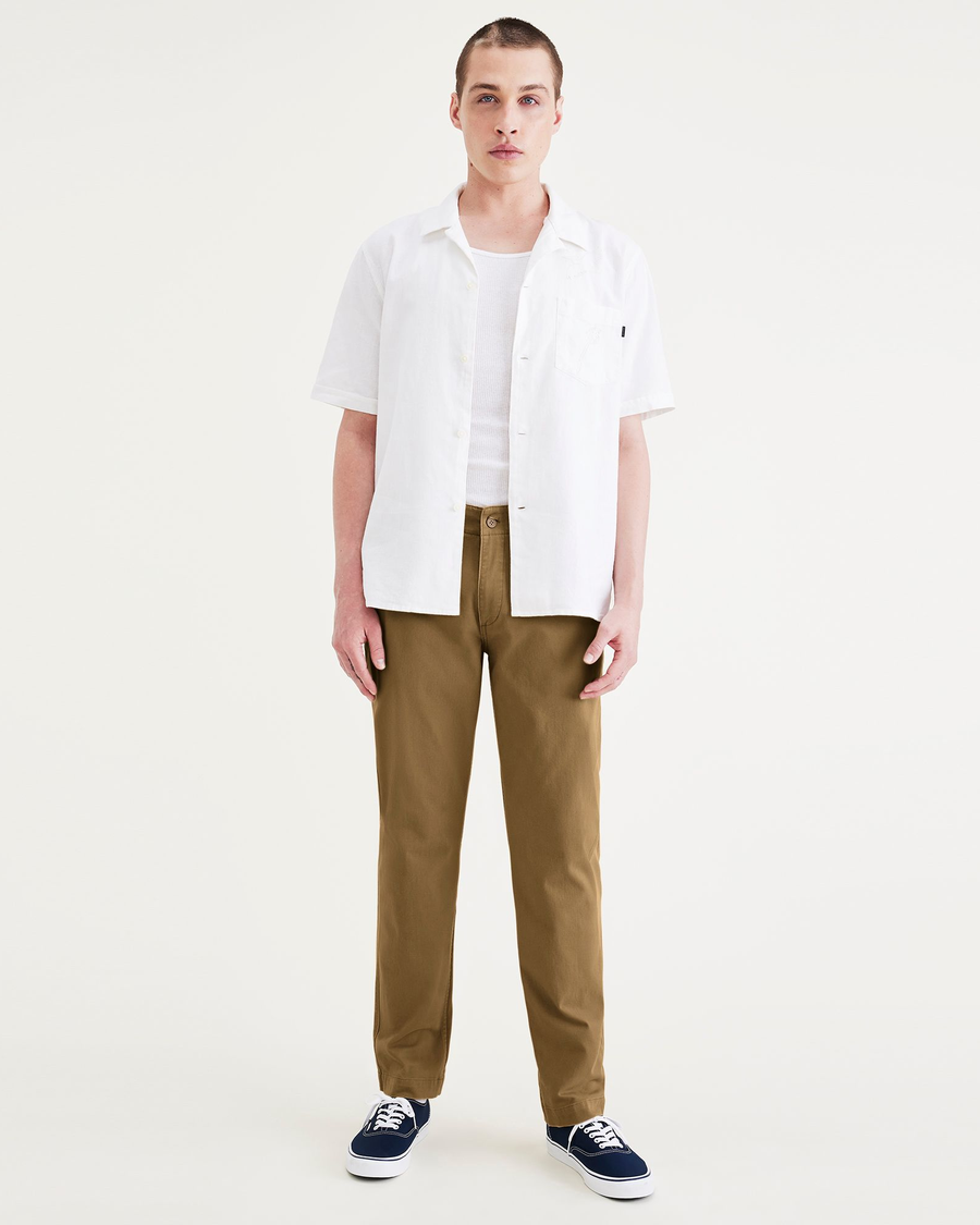 Front view of model wearing Bronze Brown Alpha Chino Pants, Slim Fit.