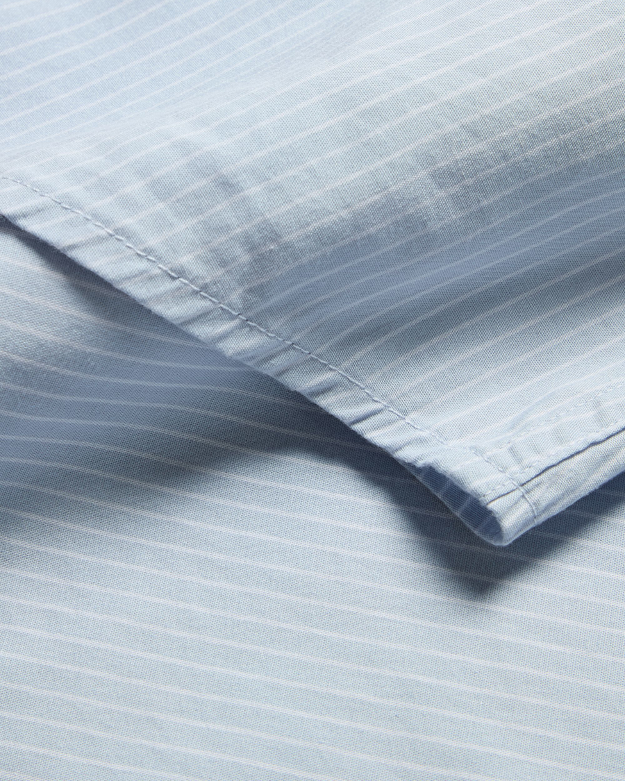 View of model wearing Burnett Subdued Blue Signature Shirt Long Sleeve with Stain Defender®, Slim Fit.