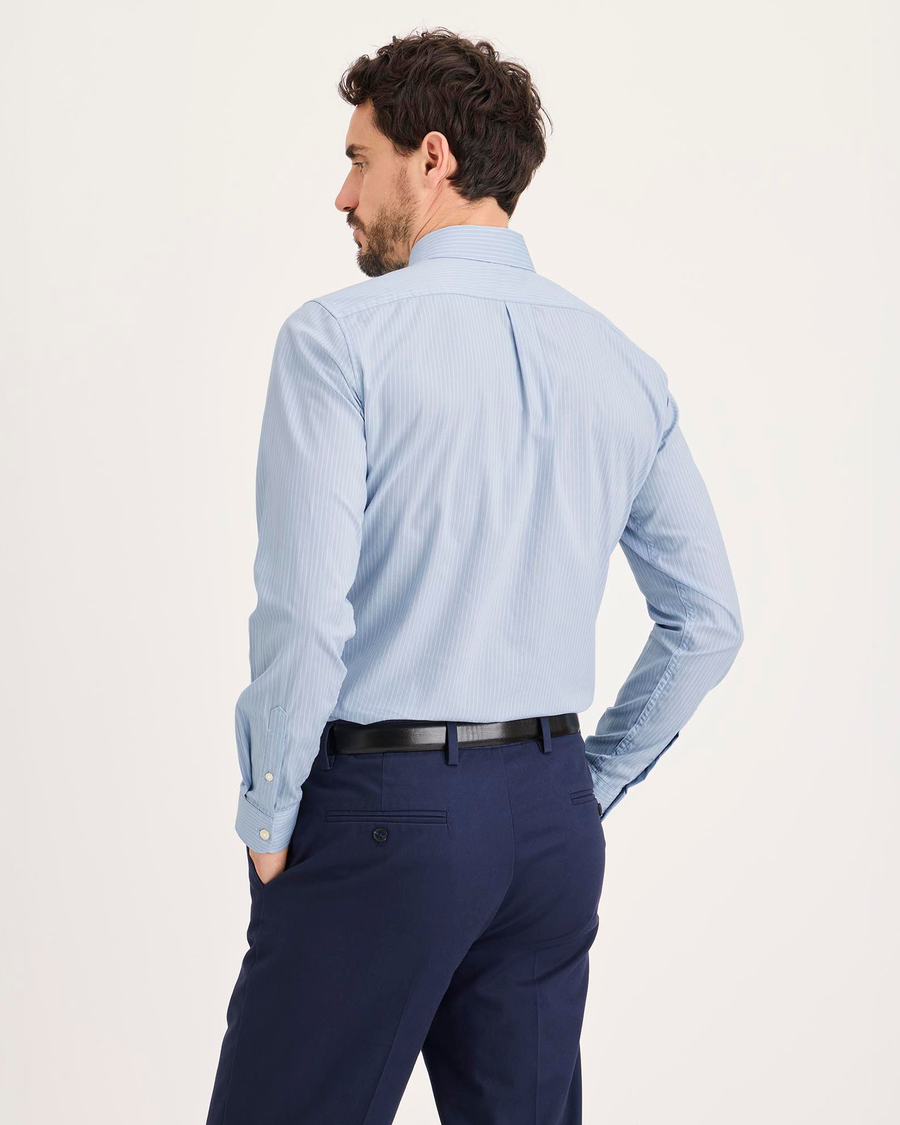 Back view of model wearing Burnett Subdued Blue Signature Shirt Long Sleeve with Stain Defender®, Slim Fit.