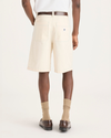 Back view of model wearing Buttercream Eighty-Six 10" Shorts, Loose Fit.