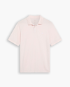 View of model wearing Calcite Pique Polo, Slim Fit.