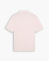 View of model wearing Calcite Pique Polo, Slim Fit.