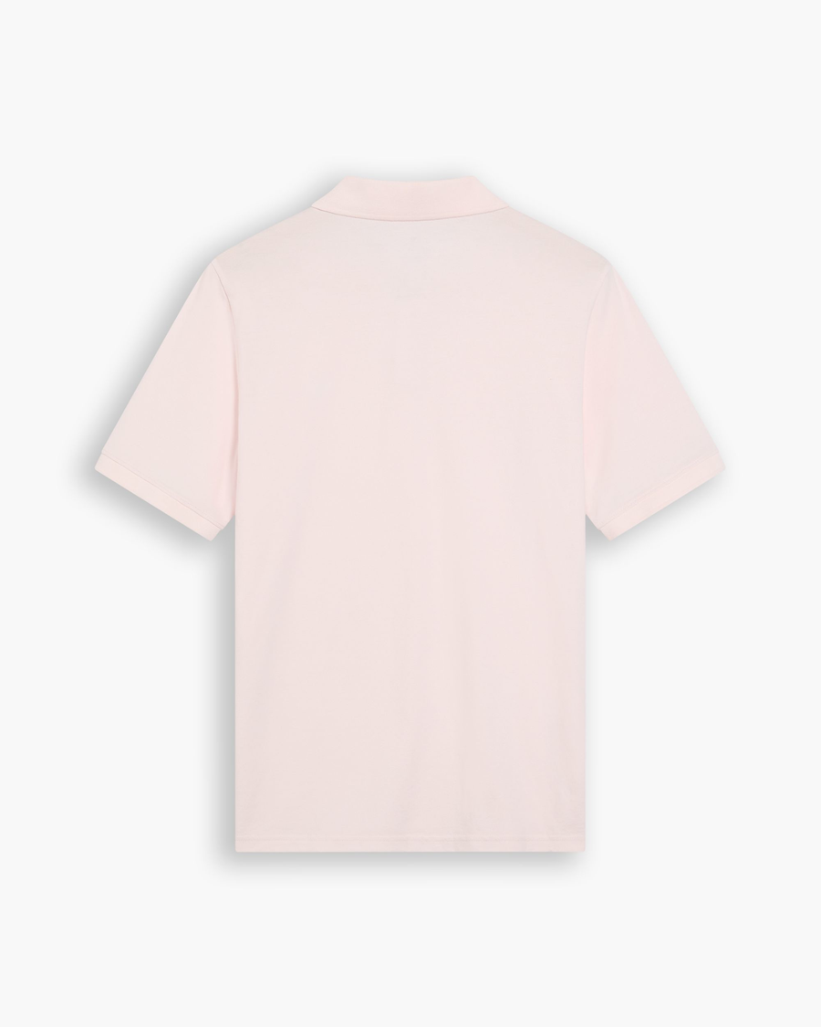 View of model wearing Calcite Pique Polo, Slim Fit.