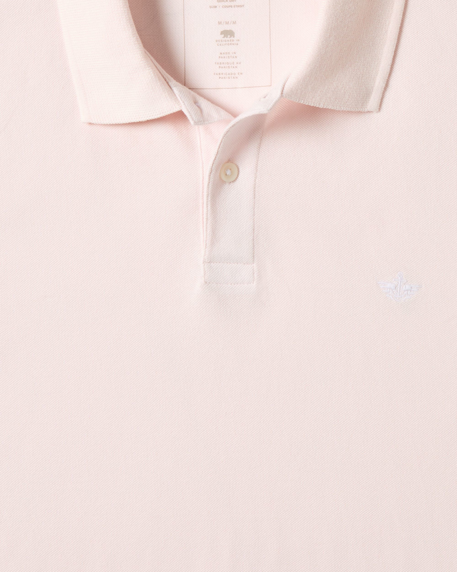 View of model wearing Calcite Pique Polo, Slim Fit.