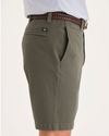 Side view of model wearing Camo Alpha Chino Shorts, Straight Fit.