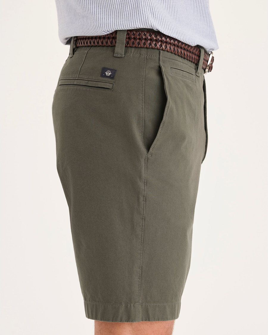Side view of model wearing Camo Alpha Chino Shorts, Straight Fit.