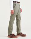 Side view of model wearing Camo Men's Skinny Fit Original Chino Pants.