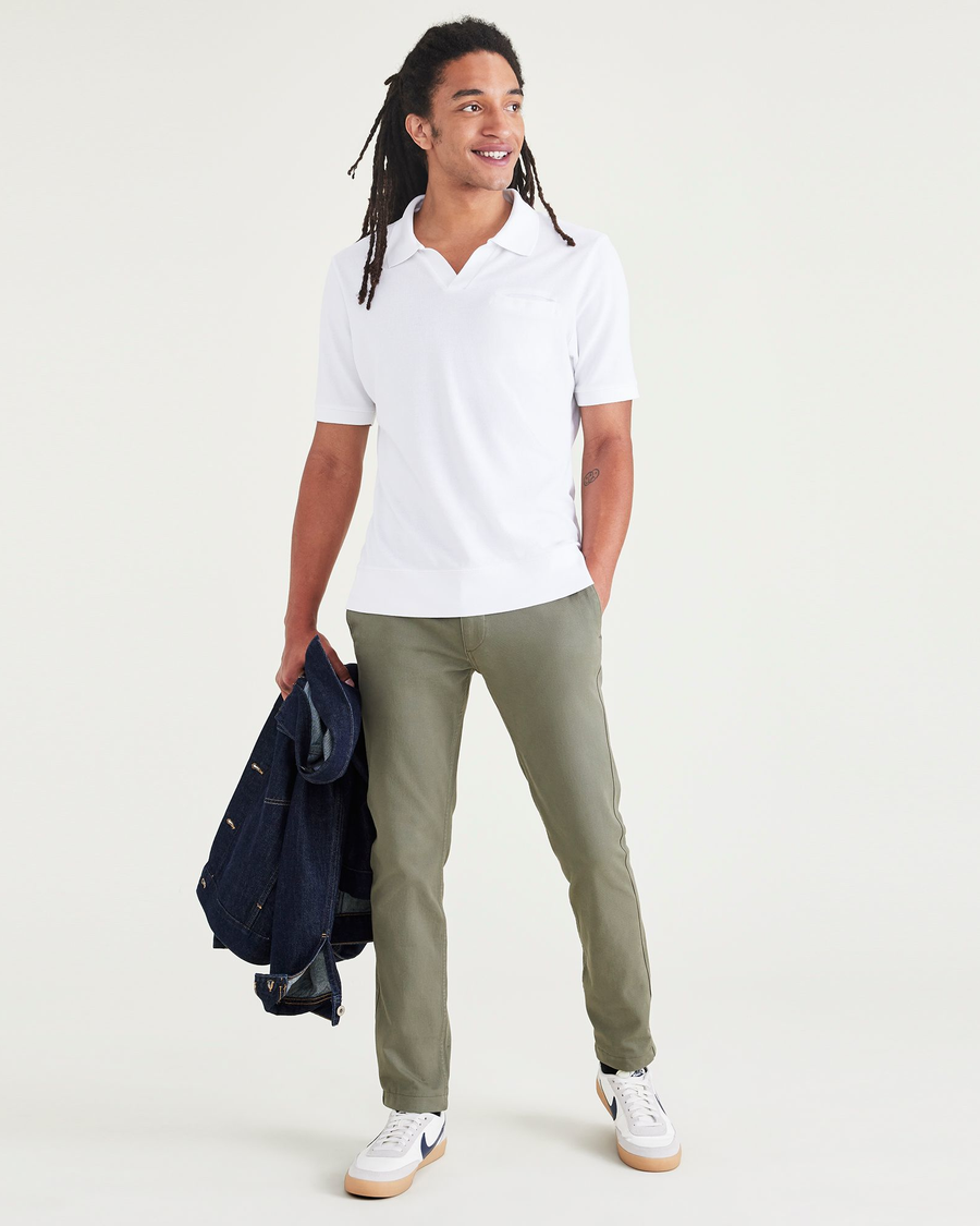 View of model wearing Camo Men's Skinny Fit Smart 360 Flex California Chino Pants.