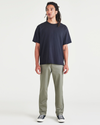 Front view of model wearing Camo Men's Slim Fit Original Chino Pants.