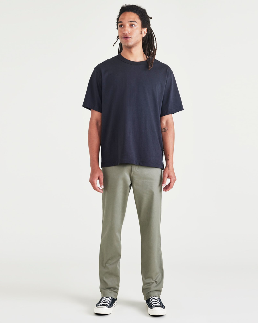 Front view of model wearing Camo Men's Slim Fit Original Chino Pants.