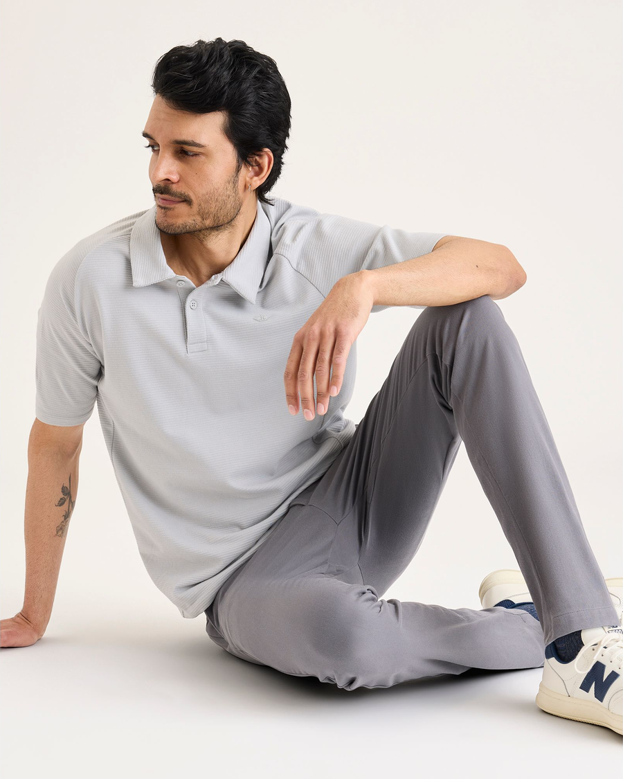 View of model wearing Car Park Grey Go Activeflex Chino, Skinny Fit.