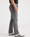 Side view of model wearing Car Park Grey Jean Cut Go, Slim Fit.