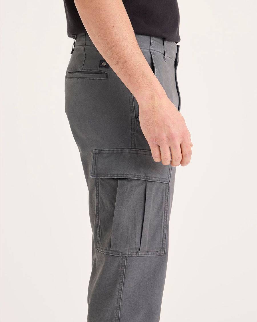 Side view of model wearing Car Park Grey Utility Cargo Pant, Straight Fit.