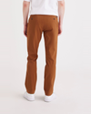 Back view of model wearing Caramel Café Men's Slim Fit Smart 360 Flex Alpha Chino Pants.