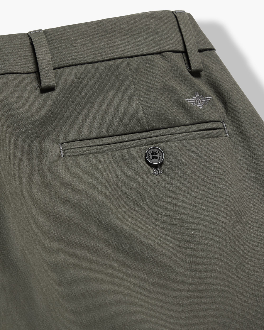View of model wearing Chimera Signature Iron Free Khakis, Slim Fit with Stain Defender®.