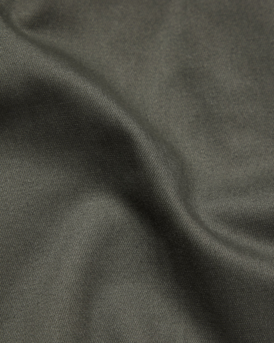 View of model wearing Chimera Signature Iron Free Khakis, Slim Fit with Stain Defender®.