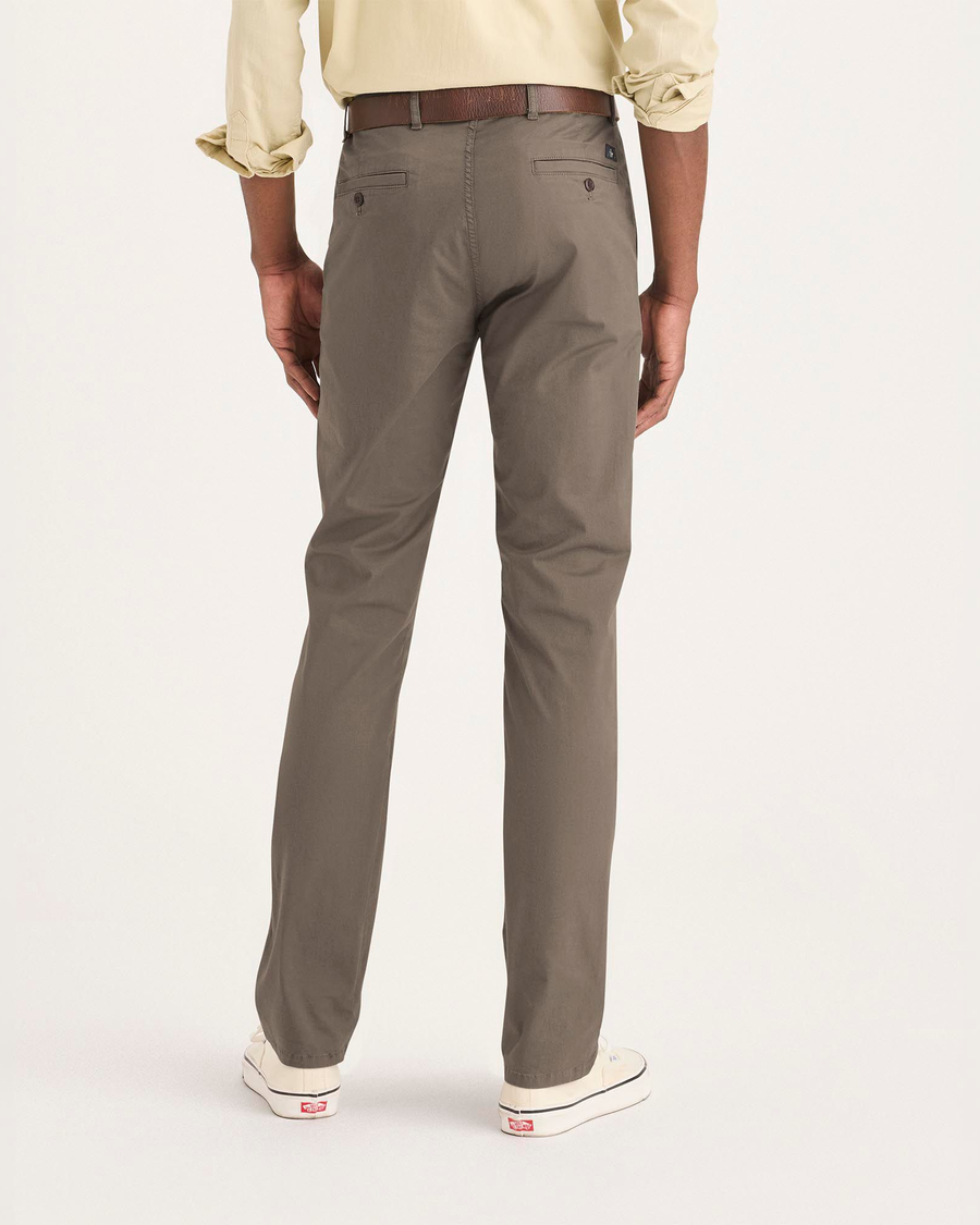 Back view of model wearing Chocolate Chip Original Chino Pants, Slim Fit.