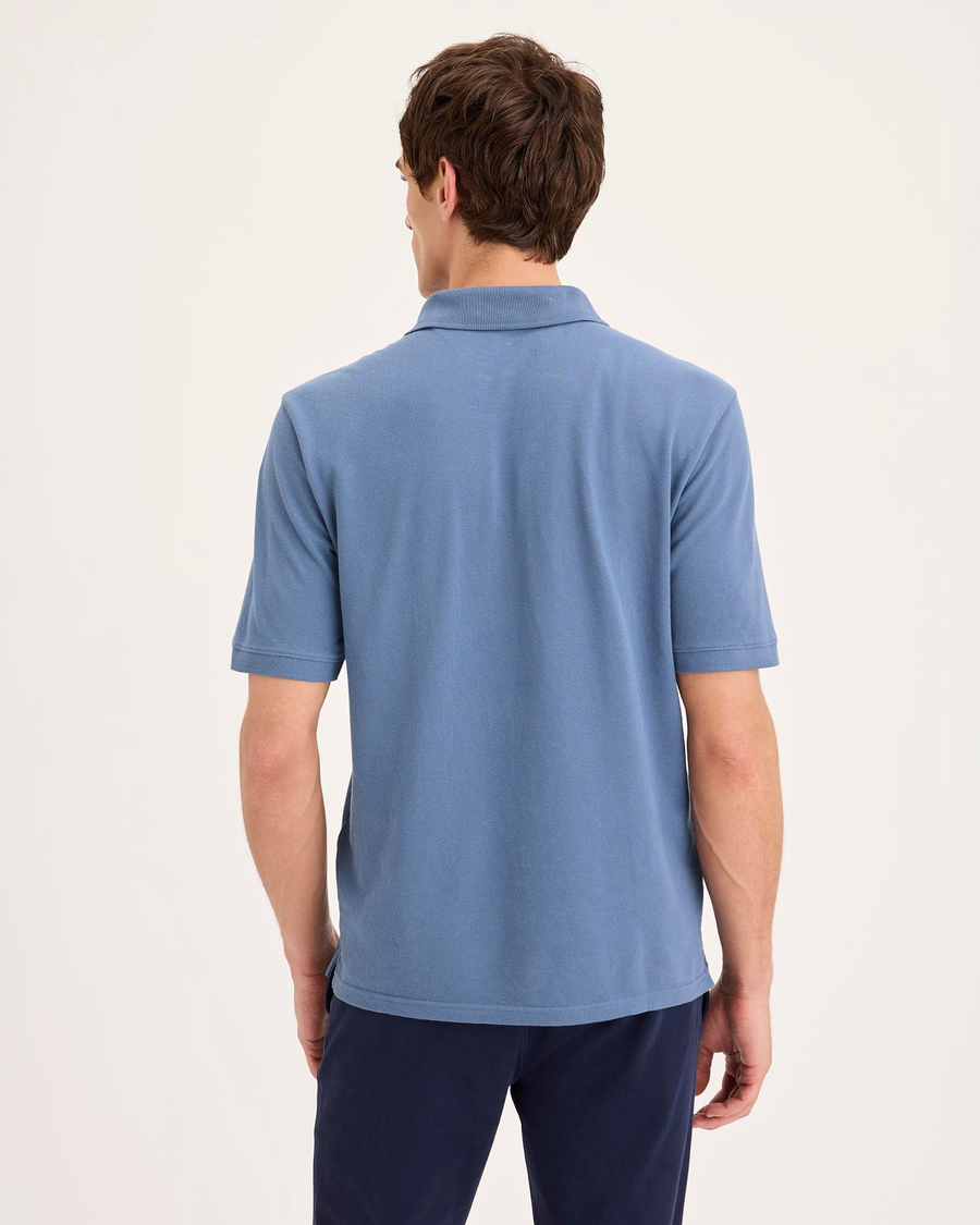 Back view of model wearing Coastal Fjord Pique Polo, Slim Fit.
