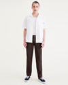 Front view of model wearing Coffee Bean Alpha Chino Pants, Slim Fit.