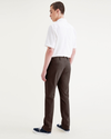 Back view of model wearing Coffee Bean Men's Slim Fit Smart 360 Flex California Chino Pants.