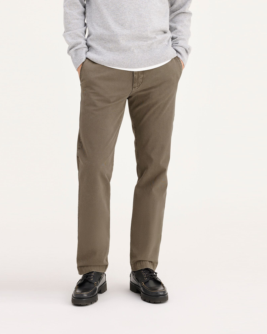 Front view of model wearing Crocodile Stonewash Men's Slim Fit Smart 360 Flex California Chino Pants.