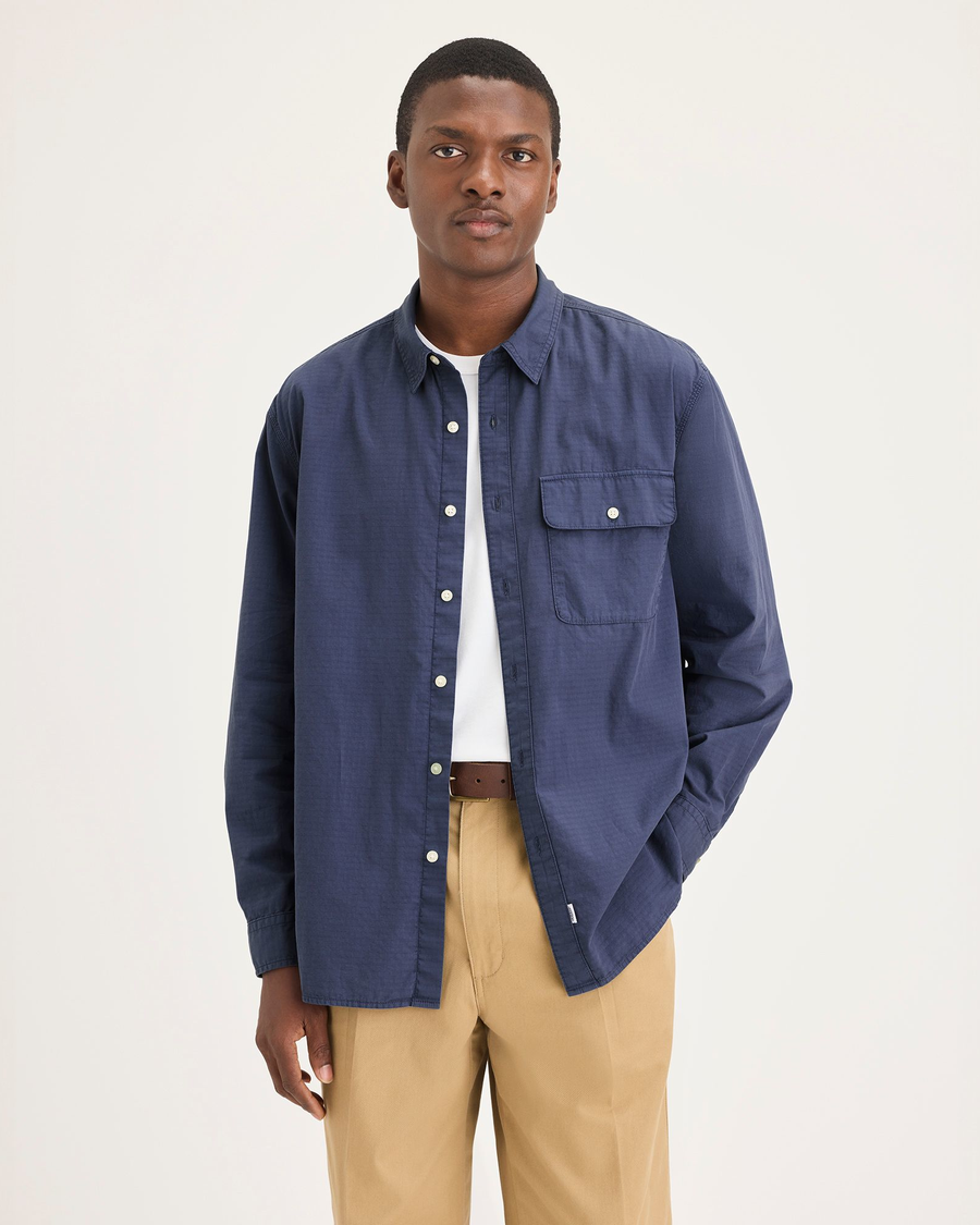 Front view of model wearing Crown Blue Men's Relaxed Fit Eighty-Six Shirt.