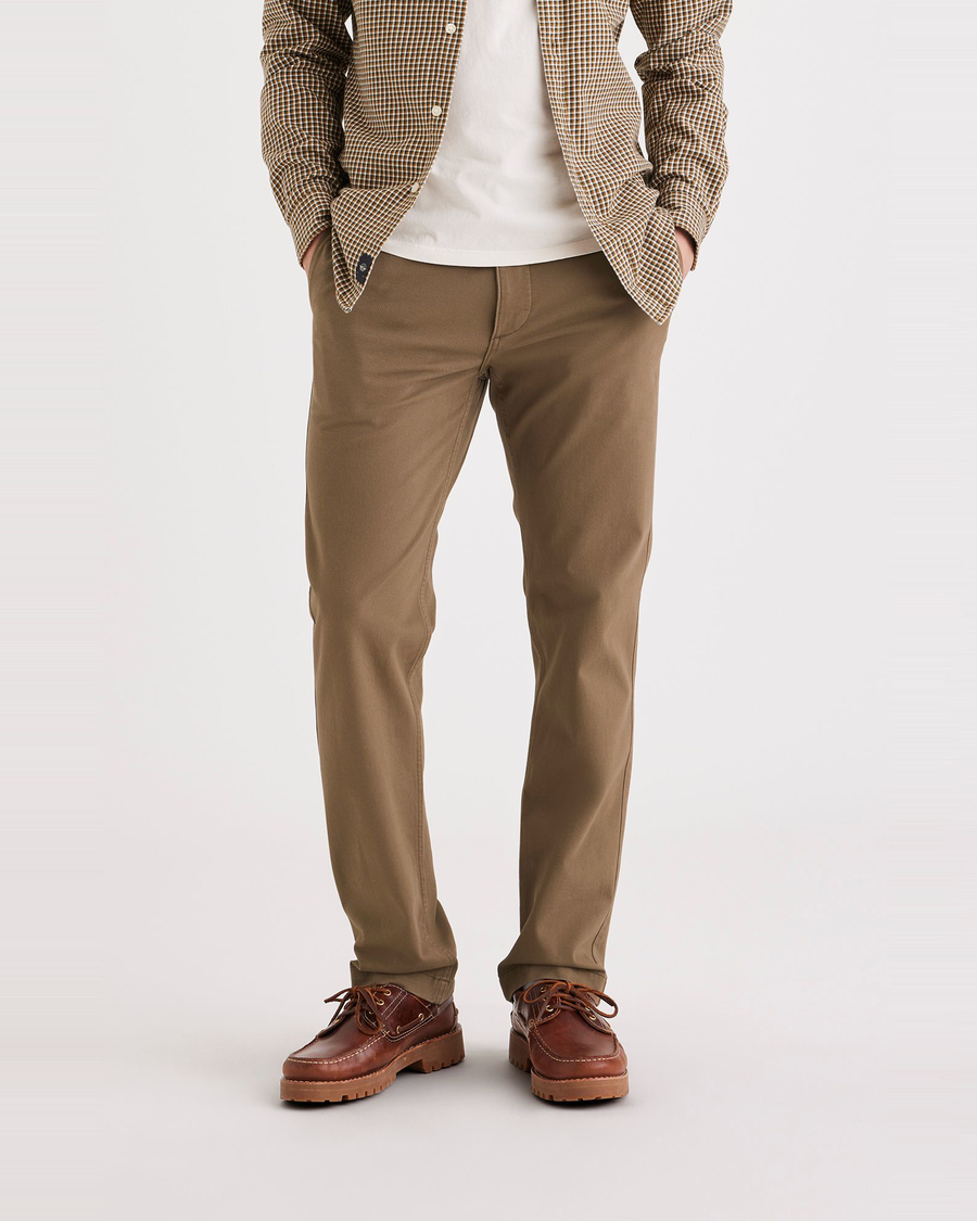 Front view of model wearing Cub Men's Slim Fit Smart 360 Flex California Chino Pants.