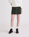 Front view of model wearing Deep Forest Women's Button Front Mini Skirt.