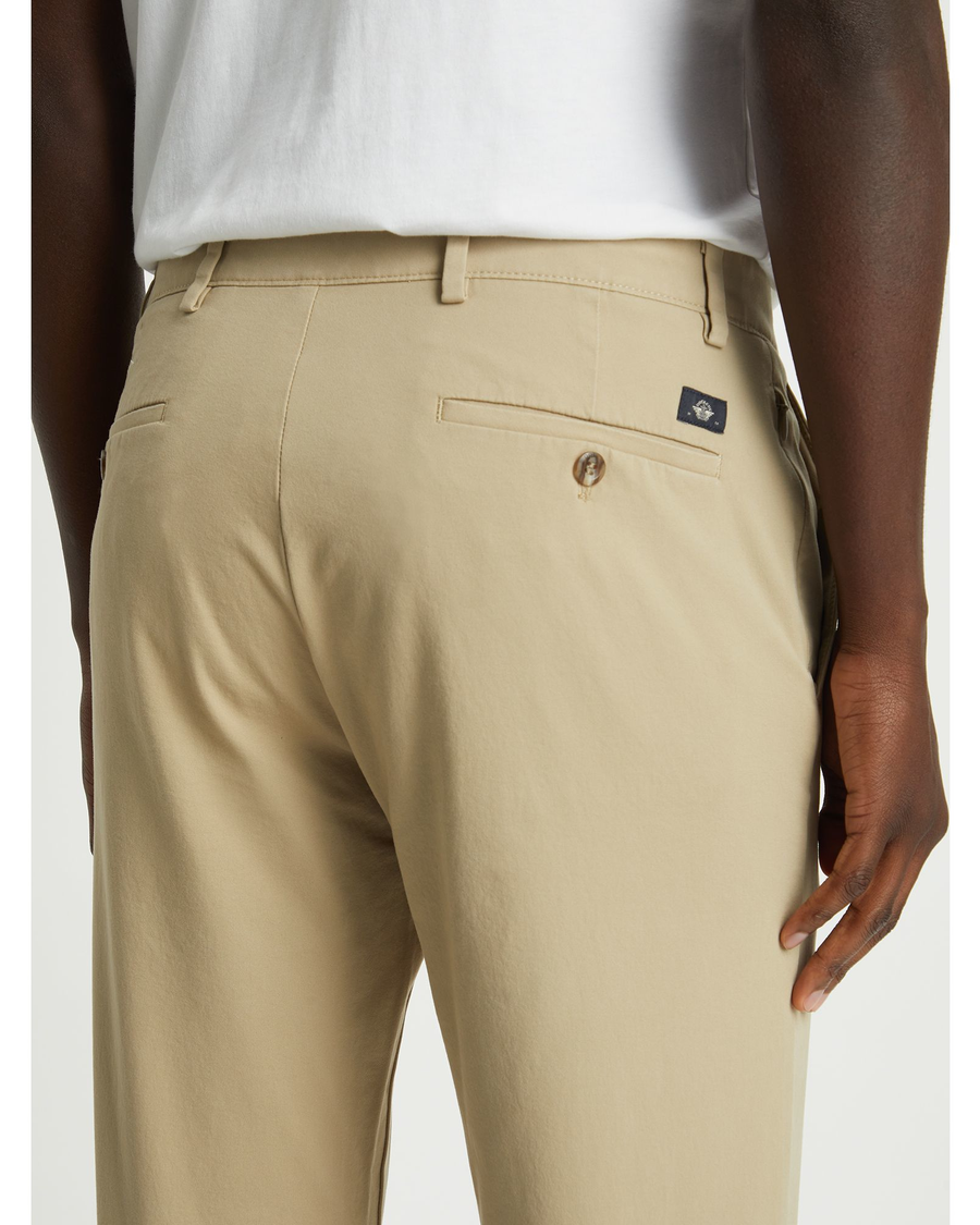 View of model wearing Dockers Khaki Crafted Khaki Pants, Slim Fit.