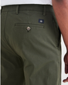 View of model wearing Dockers Olive Men's Slim Fit Smart 360 Flex Alpha Chino Pants.