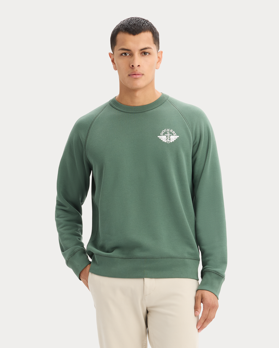View of model wearing Duck Green Icon Crewneck Sweatshirt, Regular Fit.
