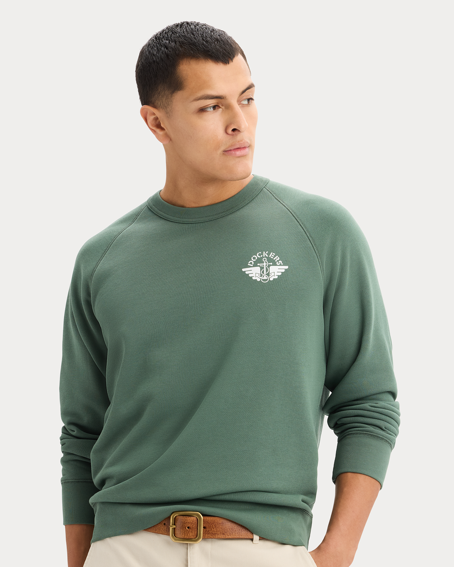 View of model wearing Duck Green Icon Crewneck Sweatshirt, Regular Fit.