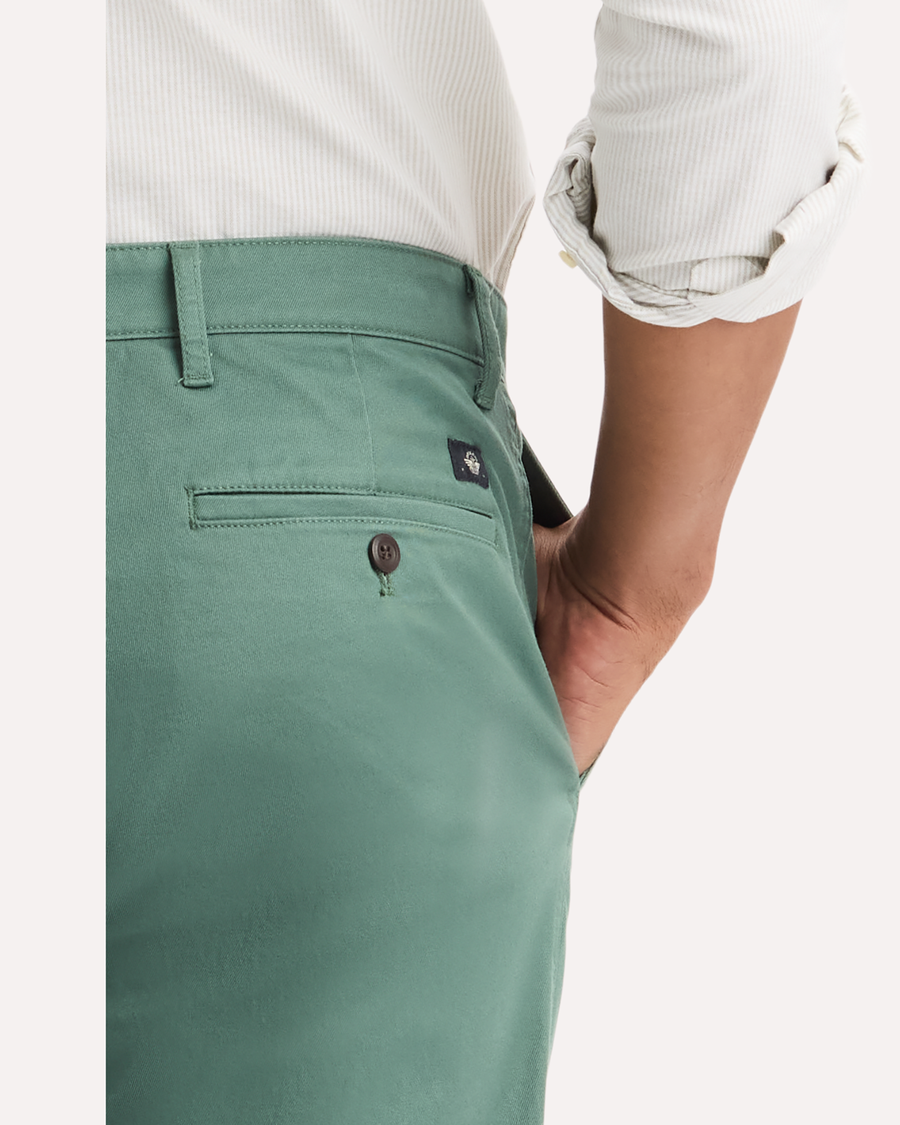 View of model wearing Duck Green Original Chino Pants, Slim Fit.