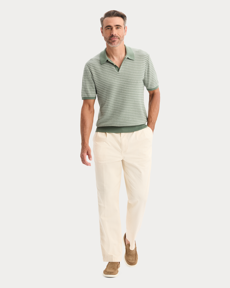 View of model wearing Duck Green Sweater Polo, Regular Fit.