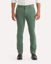 View of model wearing Duck Green Ultimate Chinos, Skinny Fit.