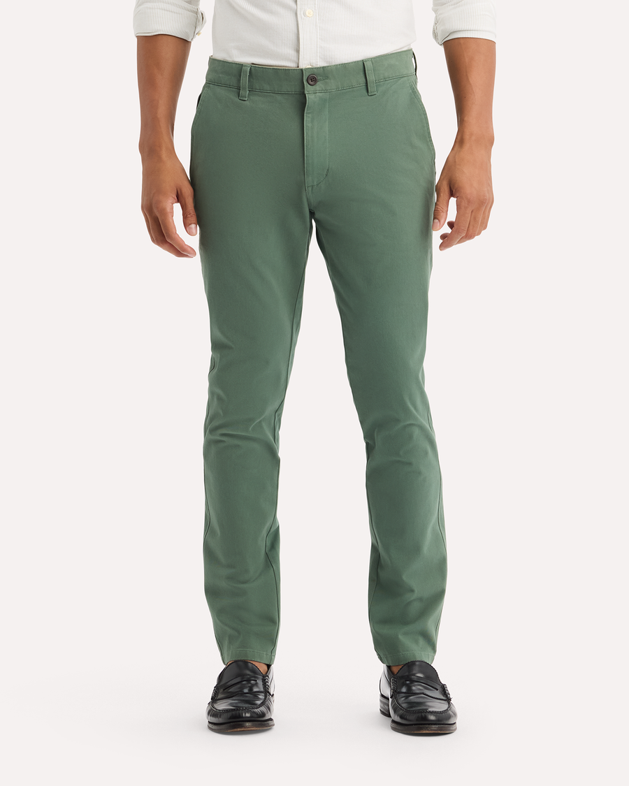 View of model wearing Duck Green Ultimate Chinos, Skinny Fit.